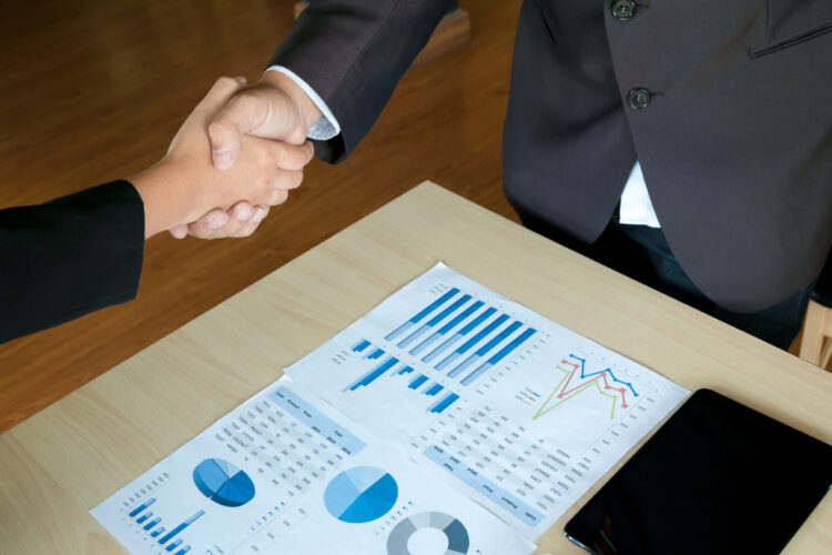 business-executives-handshaking-agreement-project-2025-10-16-04-50-57-utc