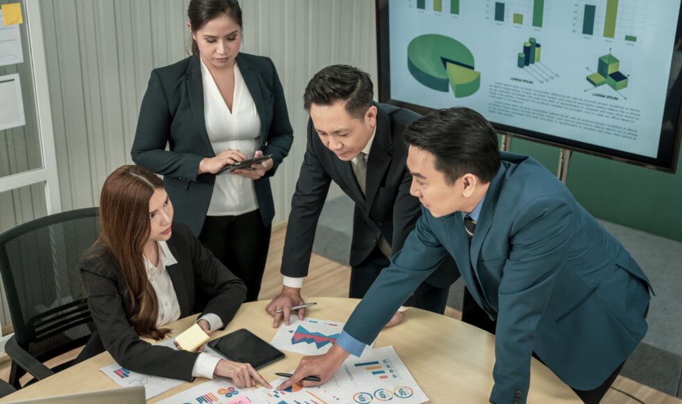 Modern Asian businessman with high confidence Committed to working together as a harmonious team Having a professional planning meeting at the company